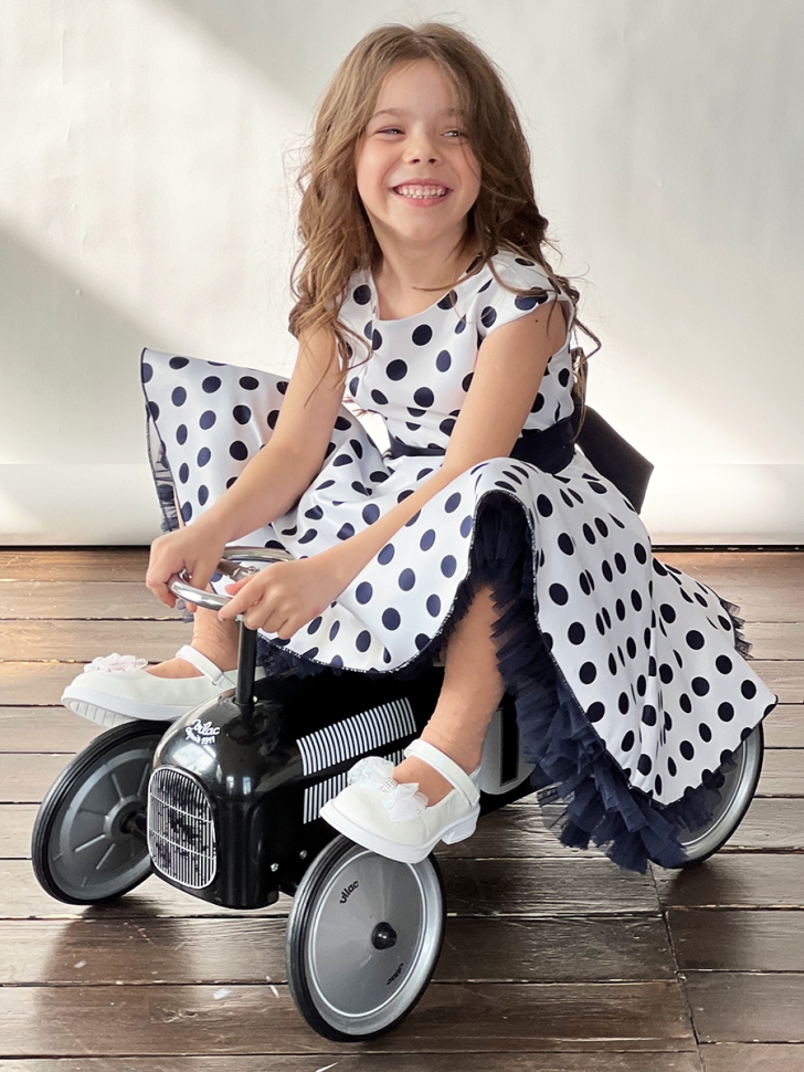 Платье для девочки нарядное БУШОН ST10, стиляги цвет белый, темно-синий пояс, принт темно-синий горошек 