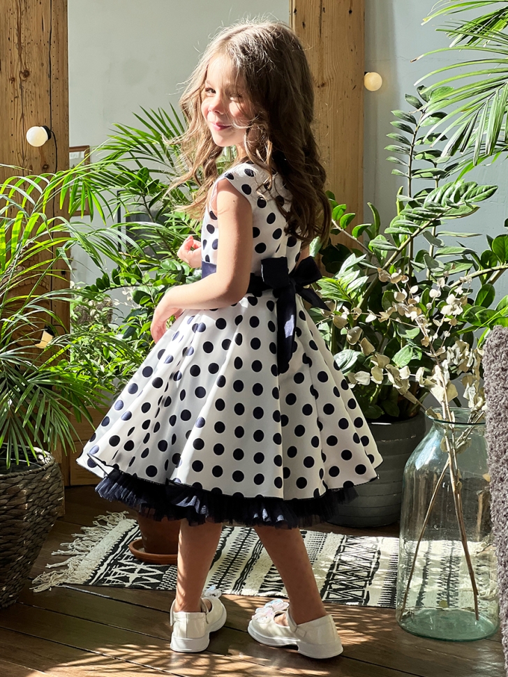 Платье для девочки нарядное БУШОН ST10, стиляги цвет белый, темно-синий пояс, принт темно-синий горошек 