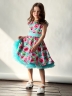 Платье для девочки нарядное БУШОН ST30, стиляги цвет бирюза/розовый пояс бирюза, принт цветы 